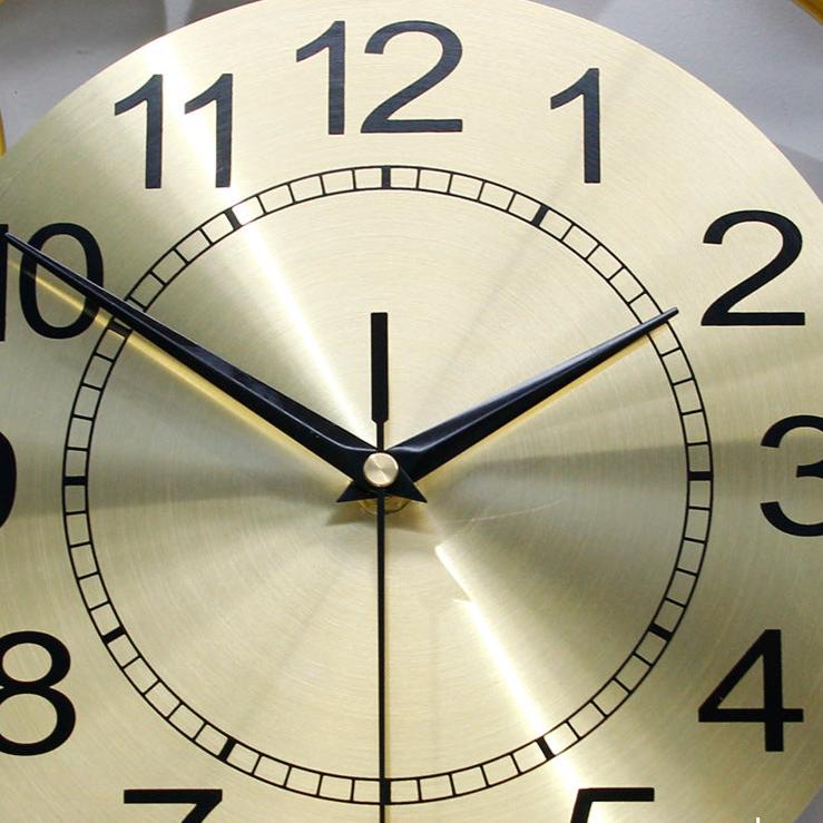 Dynamic Gold Circle Metal Wall Clock for UK interiors